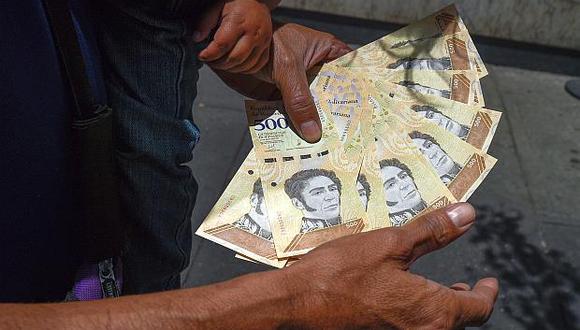 En la jornada previa, el dólar se cotizaba a 3,464.89 bolívares soberanos en Venezuela. (Foto: AFP)