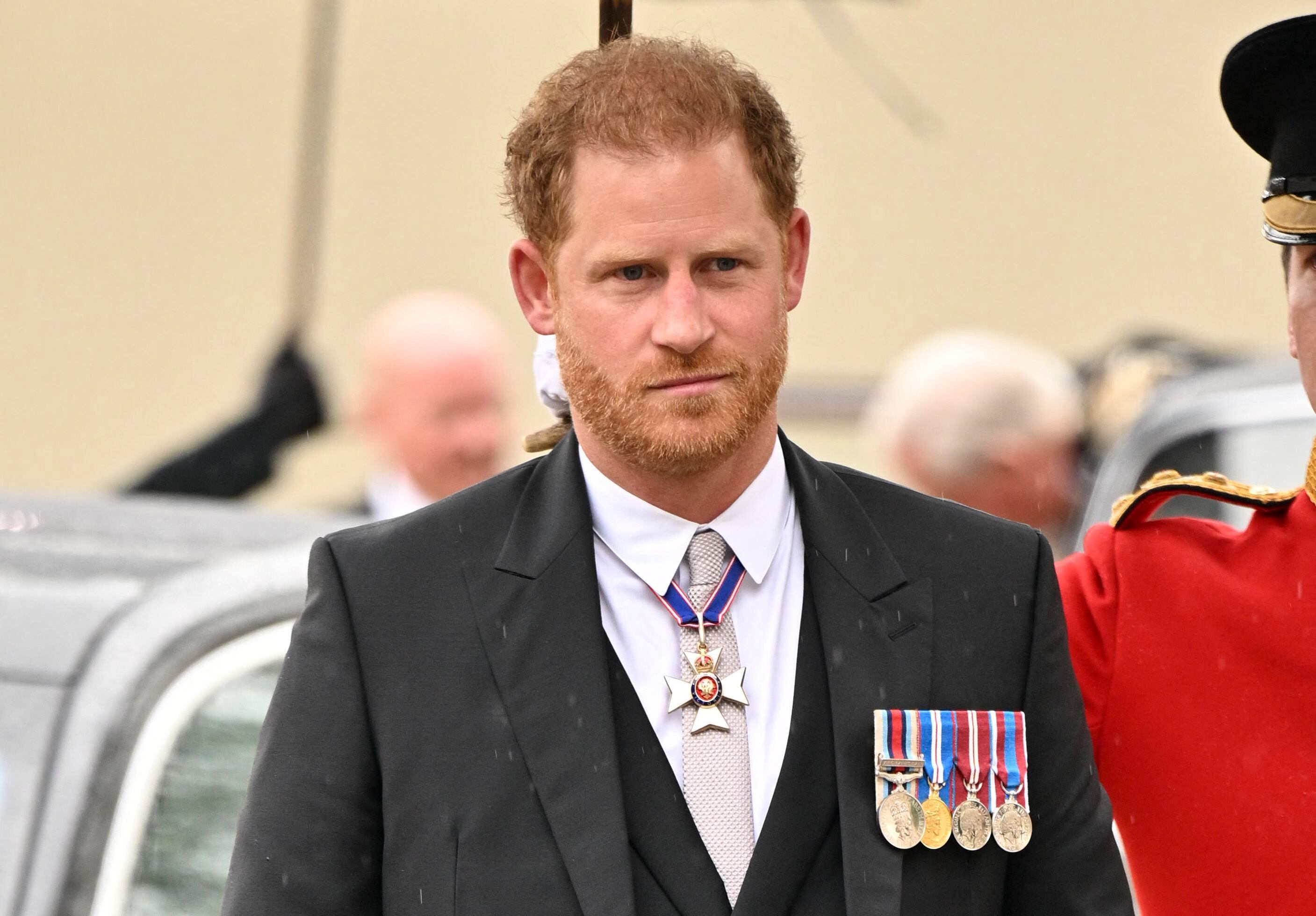 Britain's Prince Harry, Duke of Sussex arrives at Westminster Abbey in central London on May 6, 2023, ahead of the coronations of Britain's King Charles III and Camilla, Britain's Queen Consort.  (Photo by Andy Stenning / POOL / AFP)