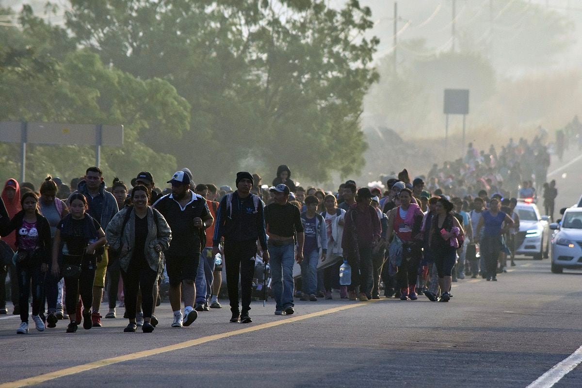 Migrants take part in a caravan heading to the border with the United States in the community of Arriaga, state of Chiapas, Mexico, on January 8, 2024. (Photo STRINGER / AFP)