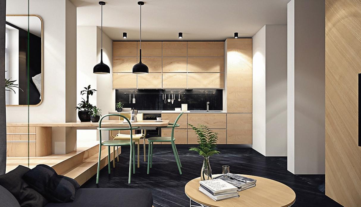 De la cómoda se extiende un tablero largo de madera que da vida a la mesa de comedor, una pieza recta y sin patas que no resulta voluminosa. Los reposteros tienen una imagen totalmente limpia y el único detalle decorativo son las baldosas de porcelanato negro, ubicado entre ambos muebles. (Foto: Studio Pine)
