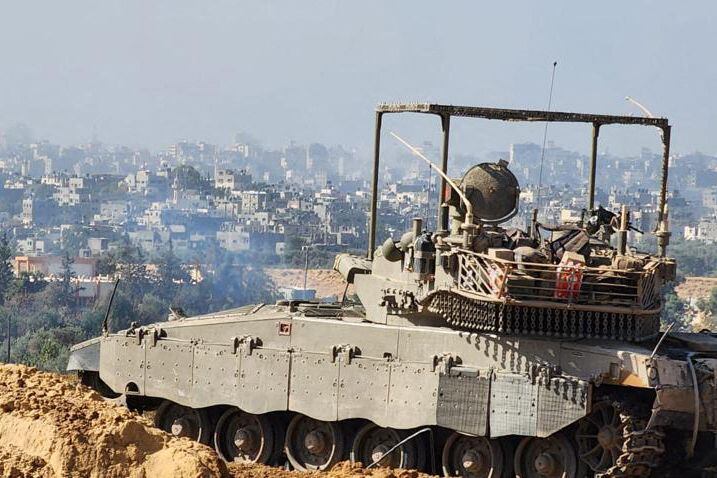 This photograph released by the Israeli army on November 15, 2023 shows soldiers in an armed vehicle during a military operation near Al-Shifa hospital in Gaza City.  (AFP).