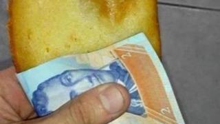 Billete usado como servilleta revela crisis en Venezuela