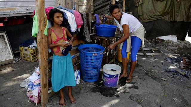 Petare | ¿Nicolás Maduro o Juan Guaidó? Qué piensan los habitantes de un peligroso barrio de Caracas | FOTOS. (EFE)