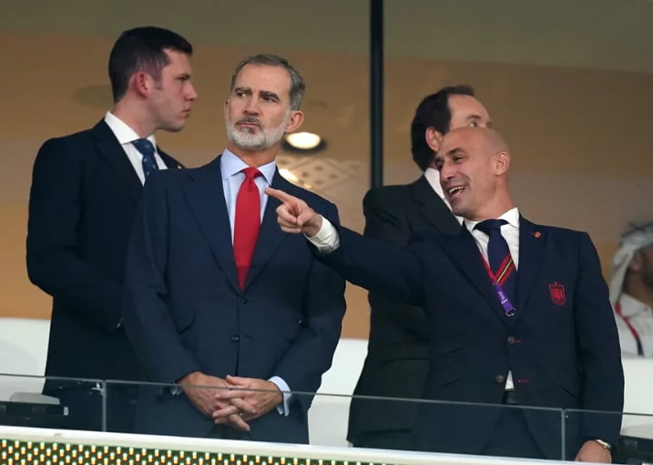 King Felipe VI of Spain and the director of the Royal Spanish Football Federation Luis Rubiales in the stands during the FIFA World Cup Qatar 2022 Group E football match between Spain and Costa Rica at Al Thumama Stadium .