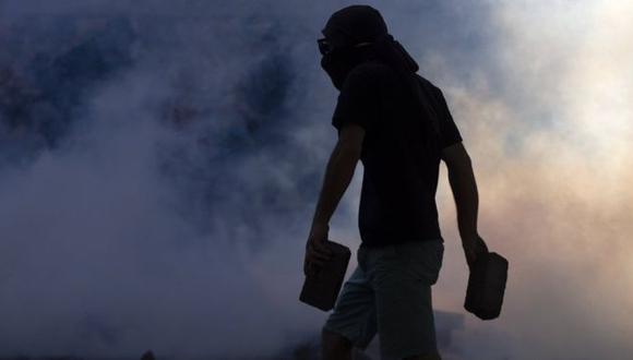 Para Müller, los saqueos, incendios simultáneos y ataques a la infraestructura pública son una demostración de que en Chile hoy reina la anarquía. (Getty Images).