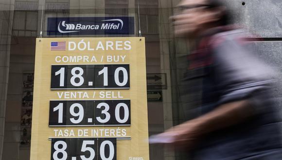 El tipo de cambio abría a la baja este martes 9 de febrero en el mercado mexicano. (Pedro PARDO / AFP)