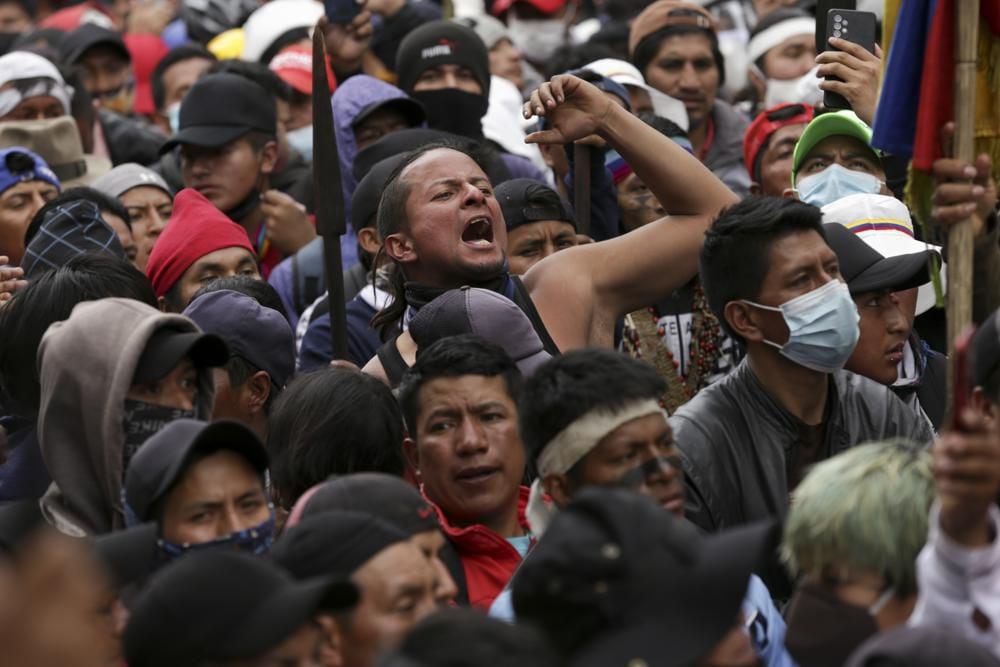 Protesters march in downtown Quito, Ecuador, on Wednesday, June 22, 2022. (AP Photo/Juan Diego Montenegro).