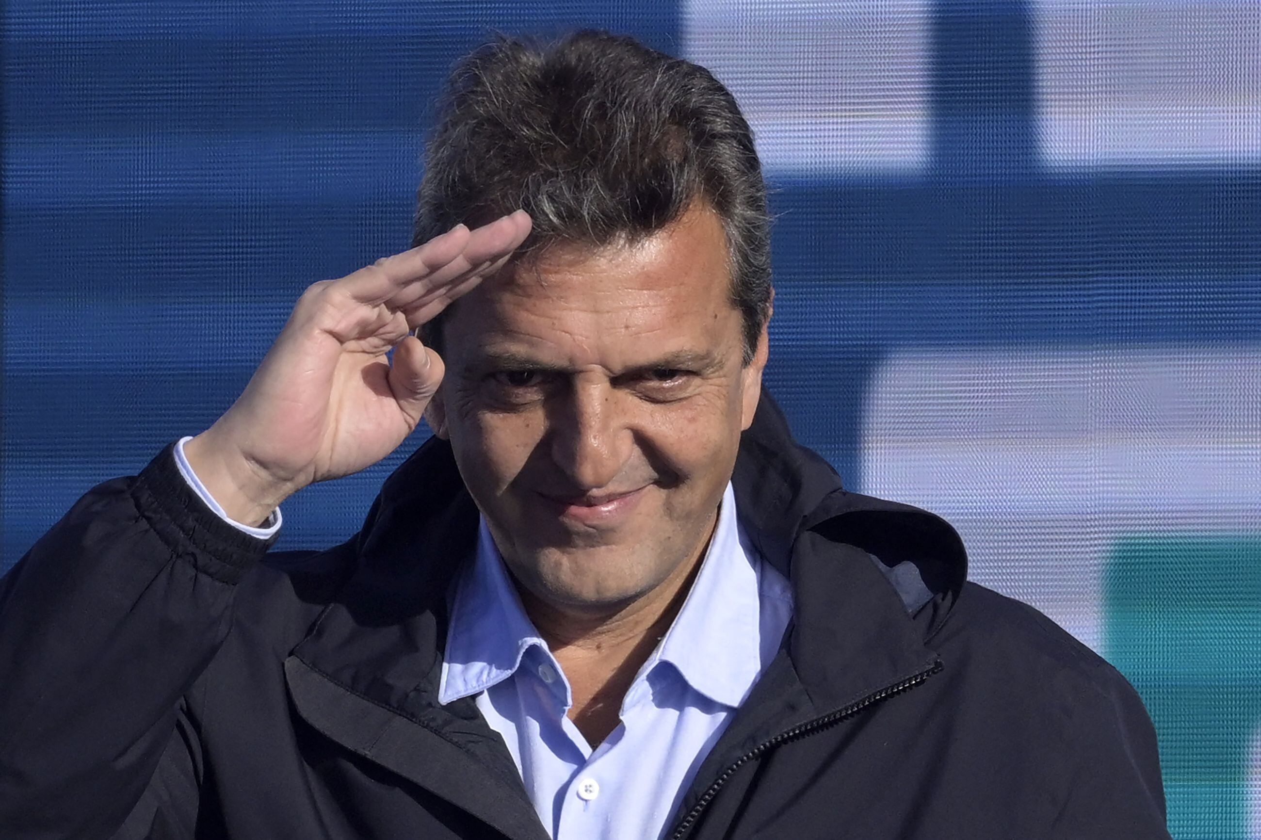 The Minister of Economy of Argentina and presidential candidate for the Union for the Fatherland party, Sergio Massa, greets his followers on October 17, 2023. (Photo by JUAN MABROMATA / AFP).