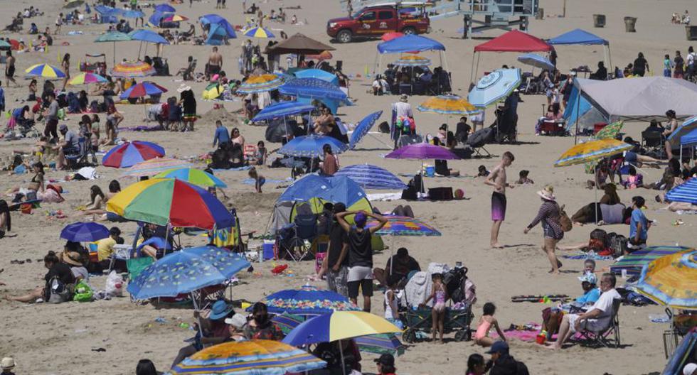 Overflow in California: thousands of tourists without masks overflow the beaches and fear of a “super contagion” event