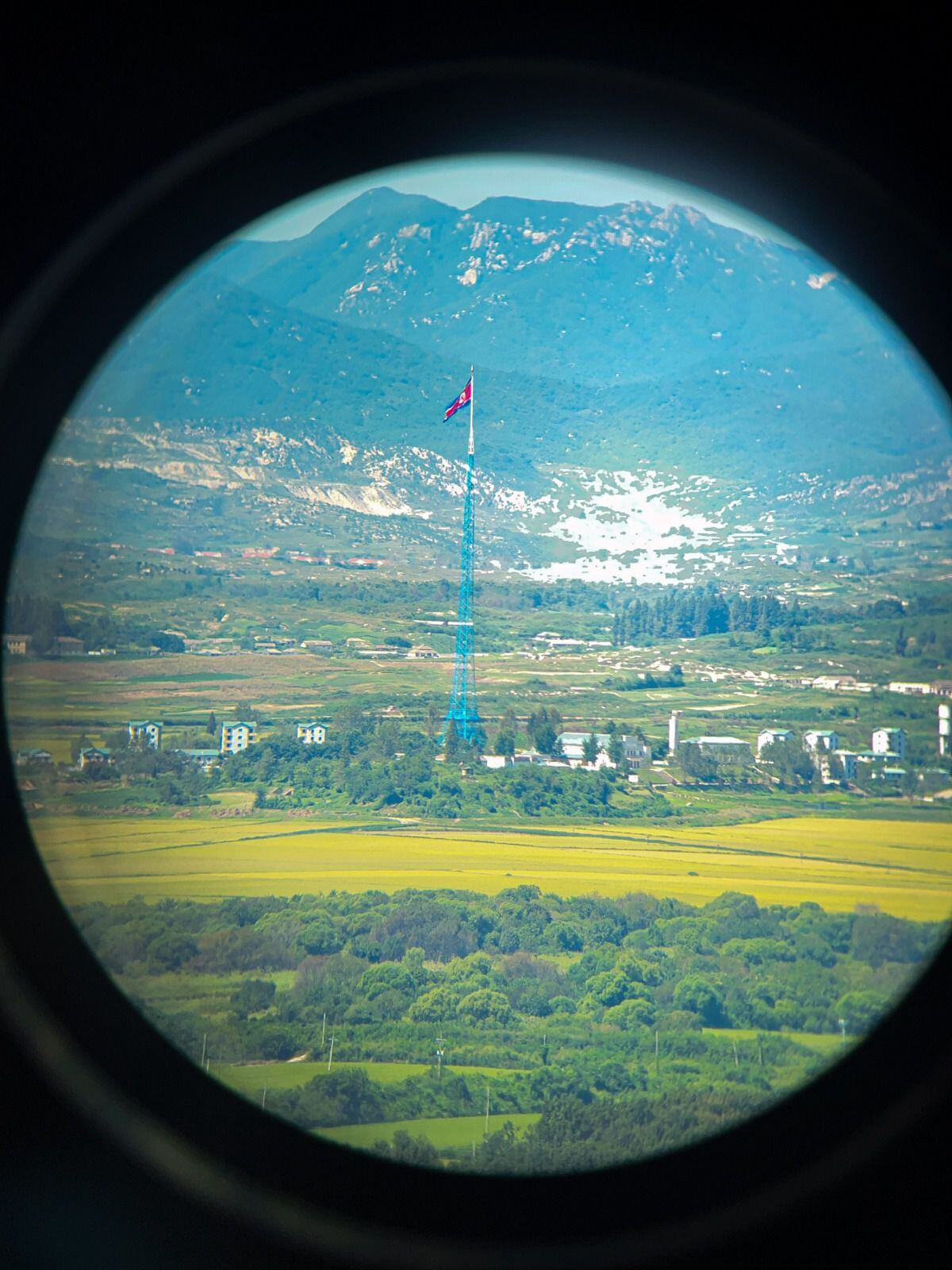 The North Korean flag can be seen much closer through the binoculars available at the observatory.  (Photo: Korean Culture and Information Service -KOCIS)