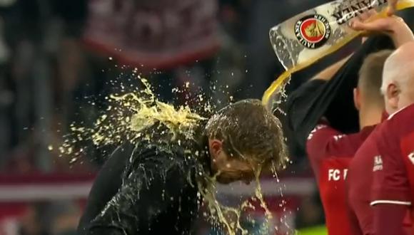 Julian Nagelsmann is drenched in beer after the title with Bayern Munich