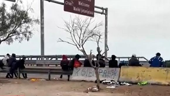 Migrantes extranjeros indocumentados fueron trasladados hacia albergues en la ciudad de Arica, en Chile (Captura América TV)