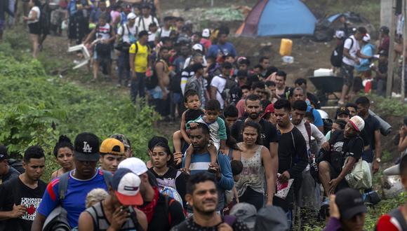 Migrantes llegan a la aldea de Bajo Chiquito, el primer control fronterizo de la provincia de Darién en Panamá, el 22 de septiembre de 2023. (Foto de Luis ACOSTA / AFP)