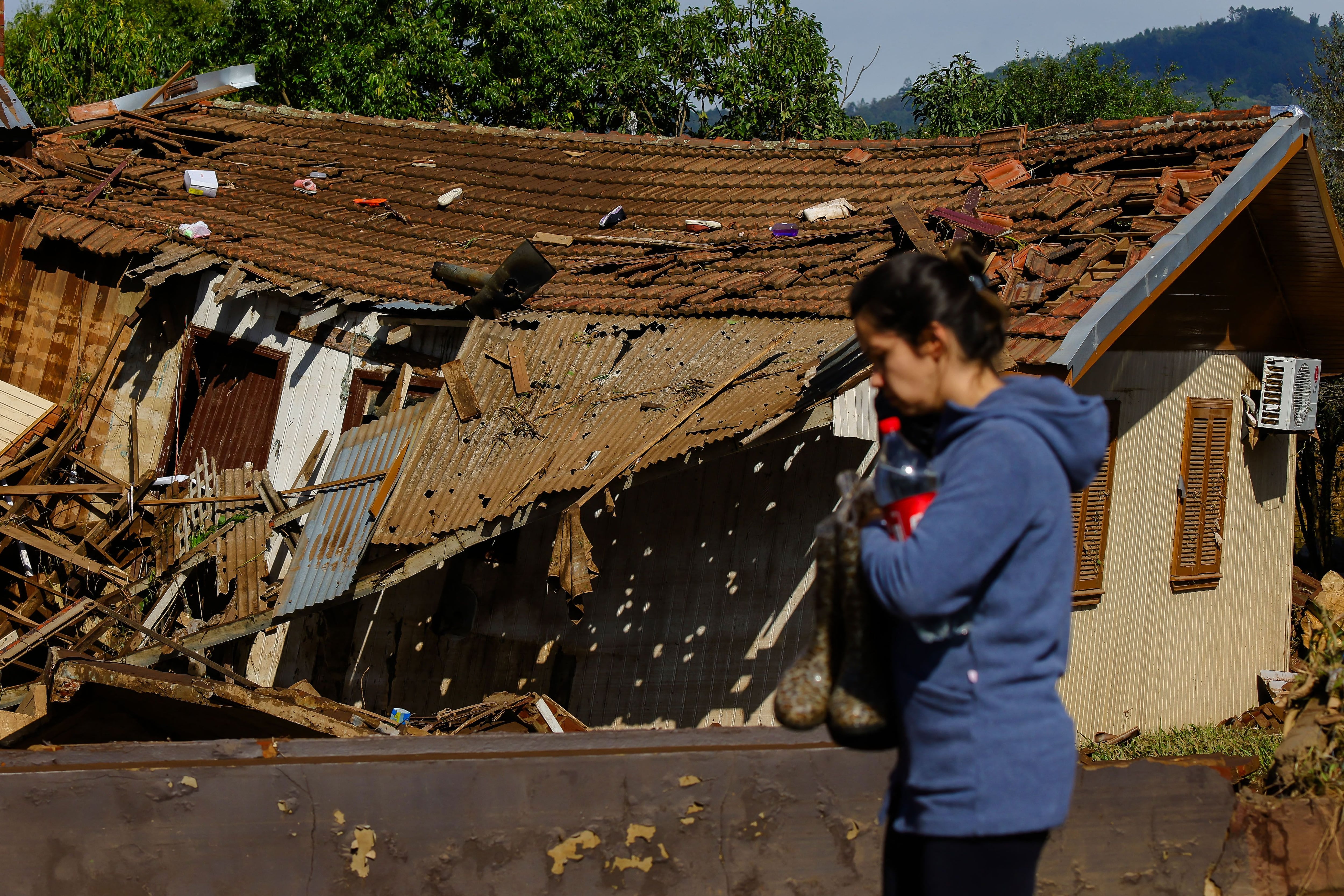 A house damaged after a cyclone in Mu um, Rio Grande do Sul state, Brazil, on September 6, 2023. (Photo by SILVIO ÁVILA / AFP).