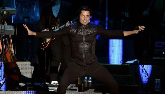 Puerto Rican singer and musician Chayanne performs at the Zocalo Square in Mexico City, on February 9, 2013. AFP PHOTO/Alfredo Estrella (Photo by ALFREDO ESTRELLA / AFP)