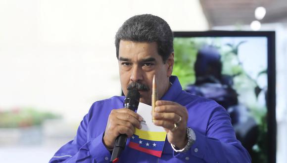 "Tenemos las pruebas en las manos y mañana el presidente (del Parlamento) Jorge Rodríguez va a mostrar las pruebas sobre el involucramiento de sectores de la extrema derecha y de grupos políticos (con las bandas criminales de Caracas", dijo el líder chavista Nicolás Maduro. (Foto: Reuters)