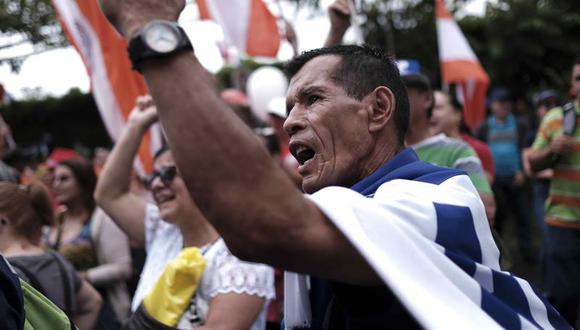 Sindicatos informaron que continuarán el diálogo con el Gobierno este sábado, pero que la huelga "se mantiene firme" en busca de una reforma tributaria "justa y solidaria". (Foto: EFE)