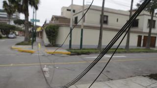Surco: cables caídos son un riesgo para peatones y conductores | FOTOS