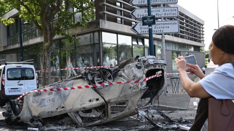 In the northern suburbs of Paris, multiple burned and overturned cars were seen on Friday morning.  (Reuters).