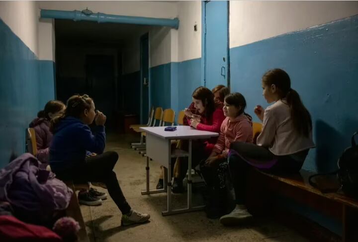 A group of girls at a shelter in Kherson, Ukraine, on February 16.  (Ivor Prickett/The New York Times)