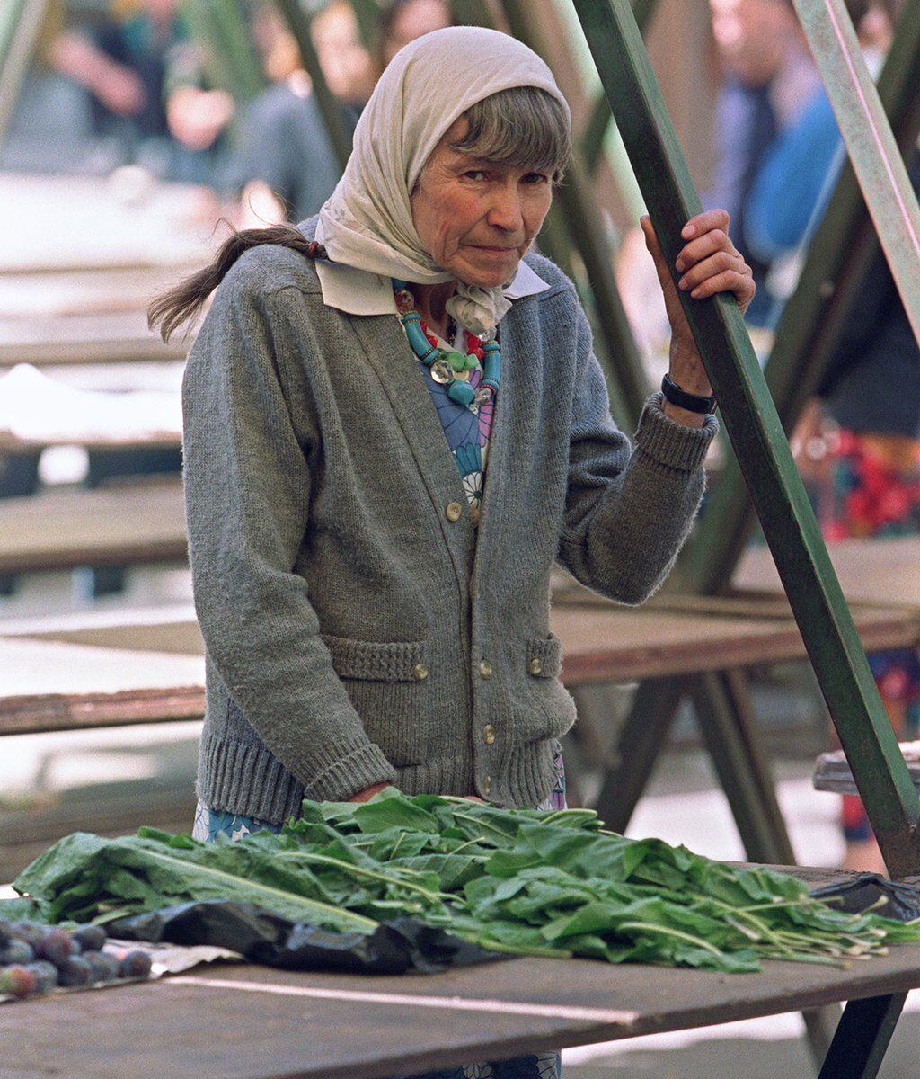 A woman selling salad leaves during the siege of Sarajevo, in the empty market.  (GETTY IMAGES)