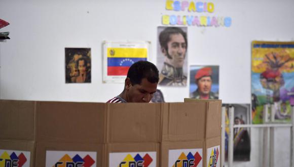 El gobernante Partido Socialista Unido de Venezuela ganó 142 de 156 circunscripciones en un proceso en el que se abstuvieron 72,6% de los 20,7 millones de electores convocados. (AFP)
