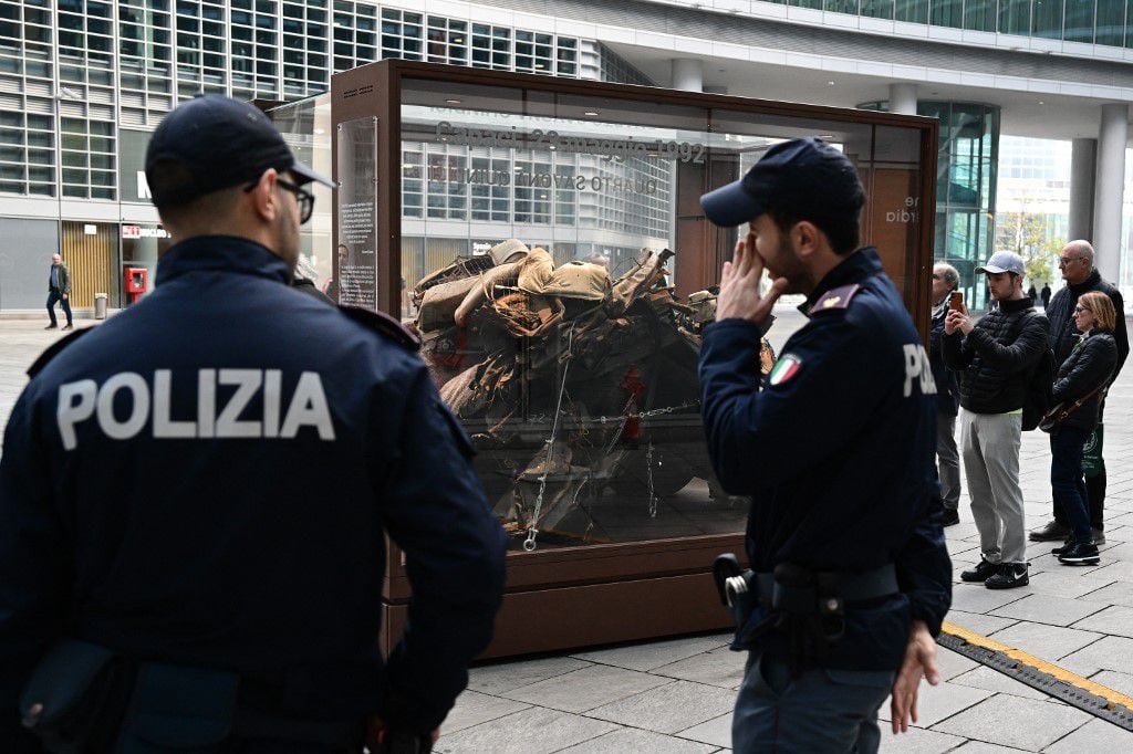 The remains of the vehicle in which the anti-mafia judge Giovanni Falcone was traveling, when he was assassinated in May 1992, are on display in Piazza Citta di Lombardia in Milan. 