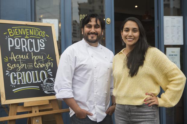     Alvaro and Ana Lucia Cornejo stand in front of the renovated Porcus facade.  Photo: Heroina Studio.