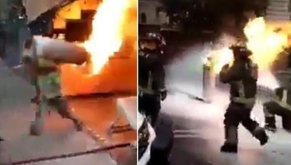 Un bombero de la Ciudad de México cargó un tanque de gas en llamas para evitar que explotara dentro de un restaurante ubicado en la alcaldía Benito Juárez. (Foto: Captura de video).