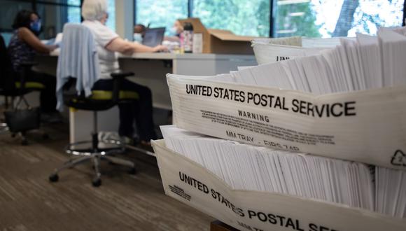El Servicio Postal de Estados Unidos ha justificado las demoras en el reparto a la falta de personal por la pandemia. (Logan Cyrus / AFP)