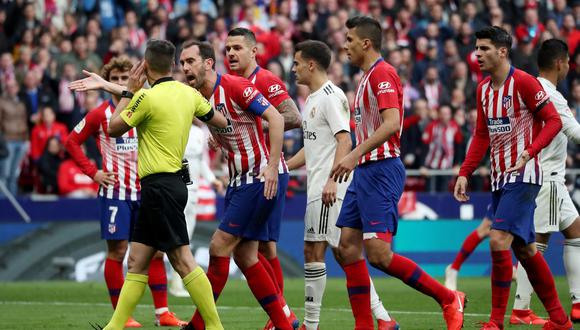 Real Madrid derrotó 3-1 al Atlético de Madrid y se quedó con el derbi madrileño por la Liga Santander. Este gran encuentro dejó varias jugadas polémicas. (Foto: AFP).