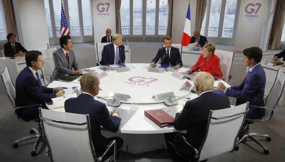 Los siete dirigentes del foro adoptaron esta posición común sobre Rusia. En la foto, los líderes del G7 y el presidente del Consejo Europeo en una mesa de trabajo. (Foto: AFP)