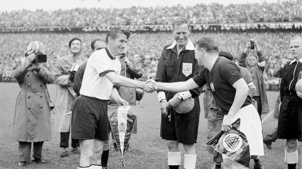 It was all smiles at the start of the 1954 World Cup final, but it was the Germans who had the last laugh.