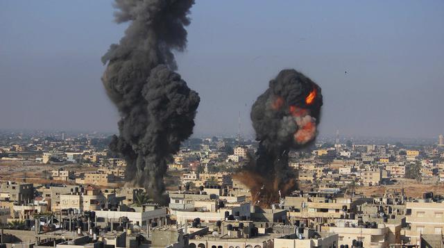 Israelíes y palestinos en medio de incesantes bombardeos - 1