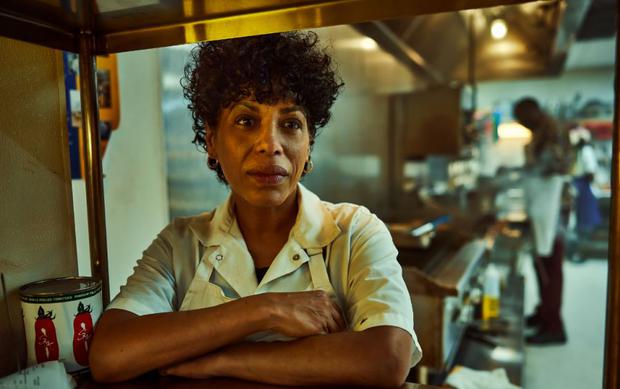 Liza Colón-Zayas is Tina, the kitchen assistant who balks at seeing a young woman as her new boss.  (Photo: HULU)