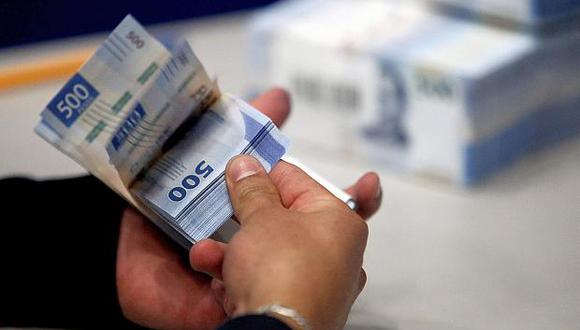 El tipo de cambio oscilaría entre 18,95 y 19,15 pesos mexicanos por dólar en la sesión del martes en México. (Foto: AFP)