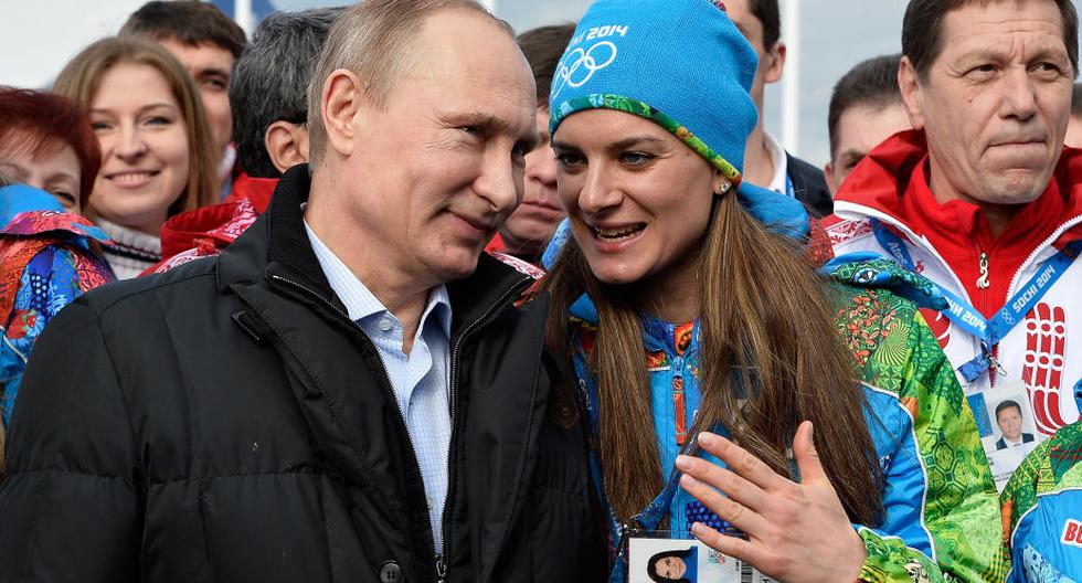 Yelena Isinbayeva y Vladimir Putin. (Foto: AFP)
