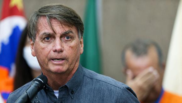 El presidente de Brasil, Jair Bolsonaro, se dirige a la prensa en Francisco Morato, estado de Sao Paulo, el 1 de febrero de 2022. (FILIPE ARAUJO / AFP).