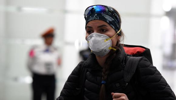 Tras conocerse el primer caso de coronavirus en México, muchos ciudadanos optaron por usar tapabocas para cubrirse nariz y boca por miedo a contagios. (Foto: AFP)