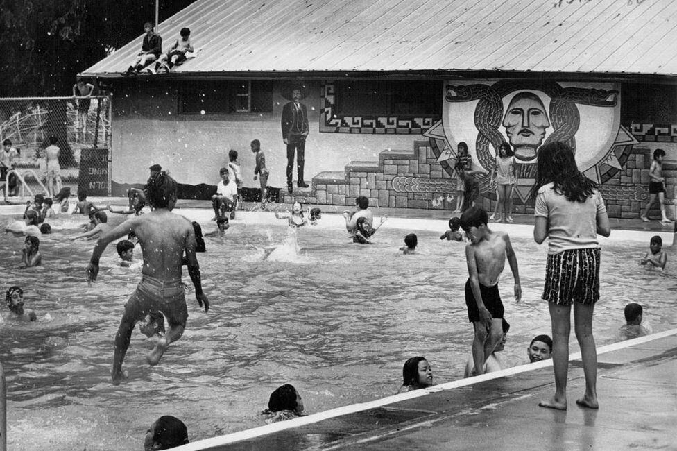 Latino children bathe in the pool at Lincoln Park, in Denver, Colorado, on January 1, 1971. (GETTY IMAGES)