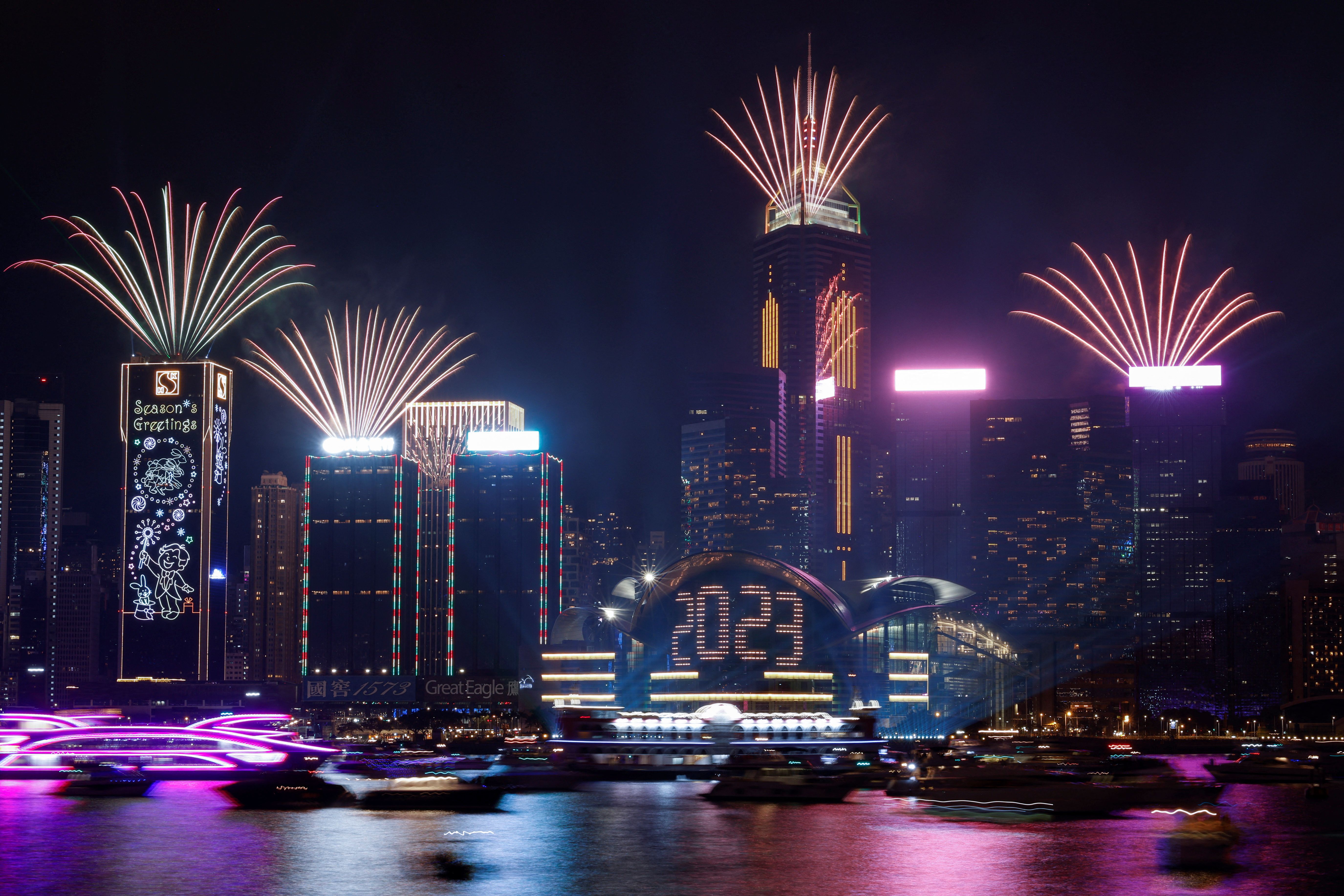 Fireworks explode over Victoria Harbor to celebrate the New Year in Hong Kong, China on January 1, 2023.
