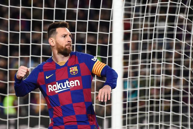 Barcelona's Argentine forward Lionel Messi celebrates after scoring during the Spanish league football match between FC Barcelona and RC Celta de Vigo at the Camp Nou stadium in Barcelona on November 9, 2019. / AFP / Josep LAGO