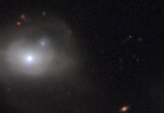 ESO: astrónomos descubren un agujero negro que arrastra una galaxia a la oscuridad
