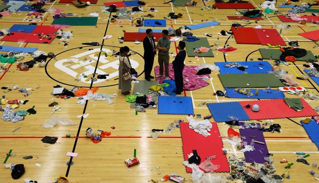 En uno de los gimnasios de la universidad, el suelo está recubierto de tapetes de yoga junto a una inmensa foto de un grupo de estudiantes de atletismo sonrientes. (Foto: Reuters)