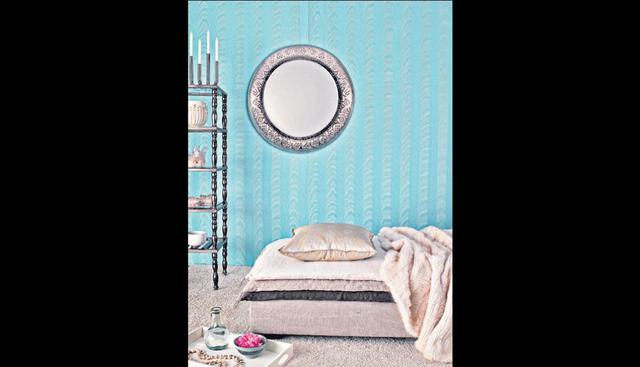 Aplica tramas verticales en las paredes con distintas tonalidades de turquesa y dale movimiento a la habitación. (Foto: Getty Images)