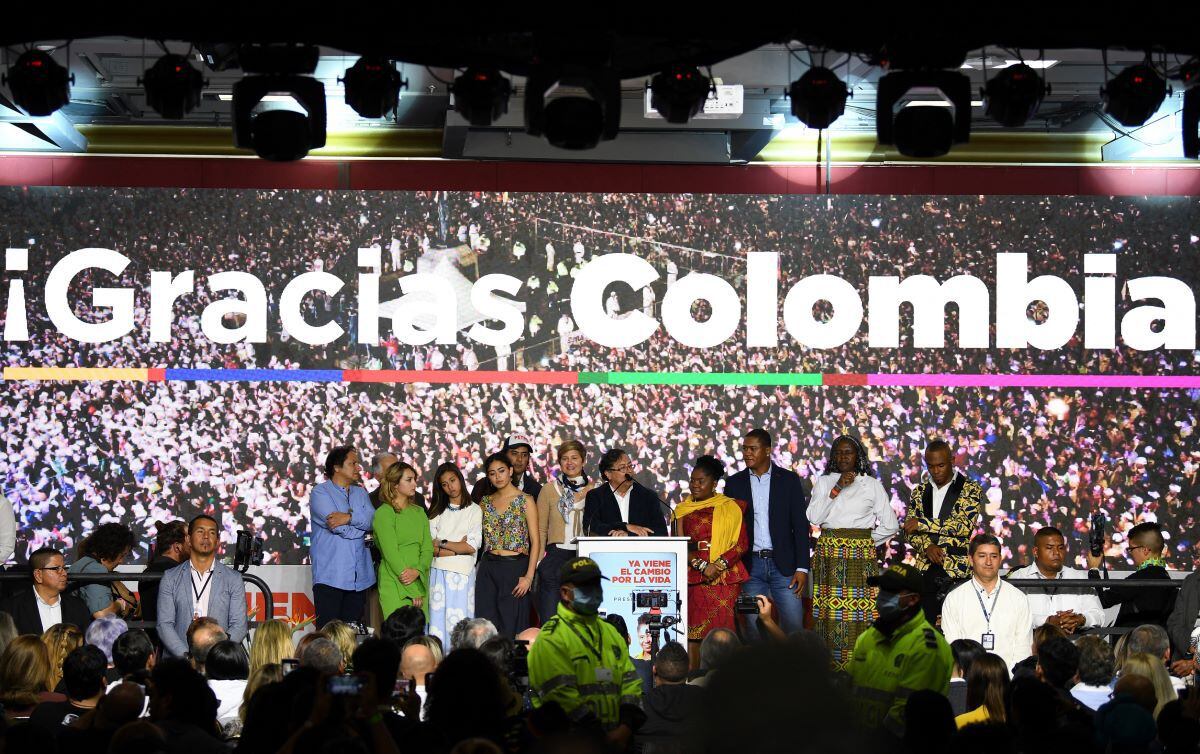The Colombian presidential candidate for the coalition of the Historical Pact, Gustavo Petro, and his running mate Francia Márquez, celebrate with their families at the party's headquarters, in Bogotá, on May 29, 2022. (YURI CORTEZ / AFP).