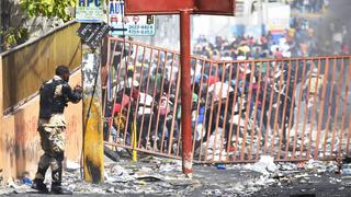 Violencia no cesa en Haití pese a que ya no subirá el precio del combustible [FOTOS]