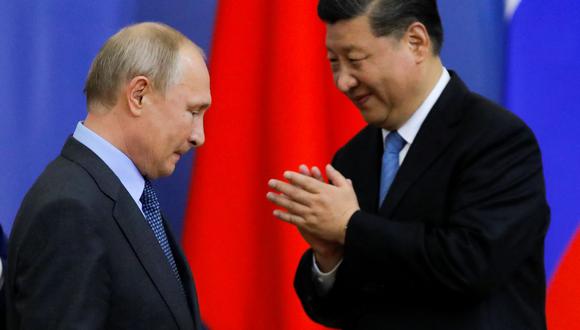 El presidente de Rusia, Vladimir Putin, y su homólogo de China, Xi Jinping, son los grandes ausentes en la COP26 de Glasgow. (DMITRY LOVETSKY / POOL / AFP).