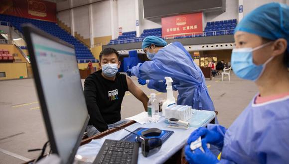 Coronavirus en China | Últimas noticias | Último minuto: reporte de infectados y muertos por COVID-19 hoy, viernes 15 octubre del 2021. (Foto: China OUT/ AFP).