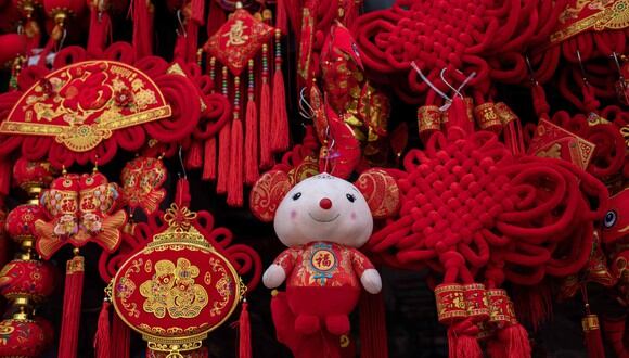 El año nuevo chino es un motivo de reunión familiar, muchas veces la única oportunidad que tienen para reencontrarse durante el año (Foto: AFP)